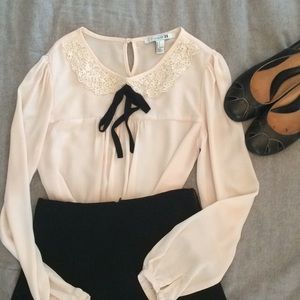 Cream blouse with black tie/ Peter Pan collar